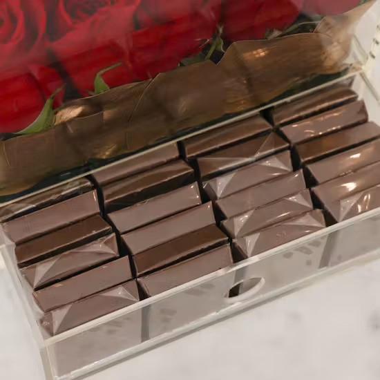 Artisan low-sugar chocolates arranged in a luxury transparent acrylic drawer